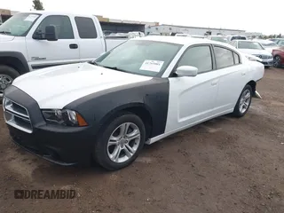 2013 Dodge Charger SE with VIN 2C3CDXBG1DH742921, listed as a IAAI auction lot 41765001 with 196,783 mi miles and . Bid and sale history available at DreamBid. Image 2.