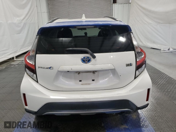 2018 Toyota Prius One z VIN JTDKDTB36J1599469, wystawiony jako Copart lot #52555355 z przebiegiem 70 316 mil mil oraz Czysty tytuł • Clean title. Historia ofert i sprzedaży dostępna na DreamBid. Obrazek 6.