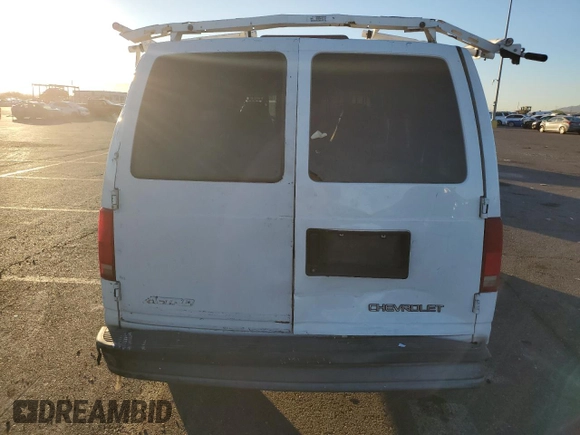 2005 Chevrolet Astro Cargo z VIN 1GCDM19X75B129778, wystawiony jako Copart lot #51354005 z przebiegiem 152 893 mil mil oraz Szkoda całkowita • Salvage title. Historia ofert i sprzedaży dostępna na DreamBid. Obrazek 6.