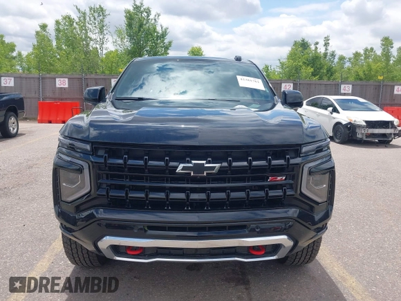 2025 Chevrolet Suburban Z71 z VIN 1GNS6DRD3SR228259, wystawiony jako IAAI lot #42381761 z przebiegiem 3 891 mil mil oraz . Historia ofert i sprzedaży dostępna na DreamBid. Obrazek 12.