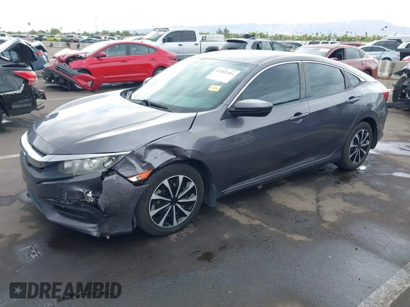 2017 Honda Civic LX with VIN 19XFC2F50HE055888, listed as a IAAI auction lot 42202494 with 147,354 mi miles and . Bid and sale history available at DreamBid. Image 17.