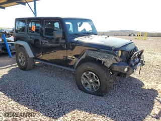 2012 Jeep Wrangler Unlimited Sport with VIN 1C4BJWDGXCL161569, listed as a Copart auction lot 50456355 with 133,703 mi miles and Salvage Title. Bid and sale history available at carsss.com. Image 4.