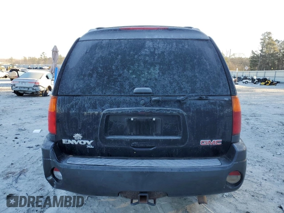 2004 GMC Envoy XL SLE with VIN 1GKET16S646128780, listed as a Copart auction lot 42220105 with 277,349 mi miles and Salvage Title. Bid and sale history available at carsss.com. Image 6.