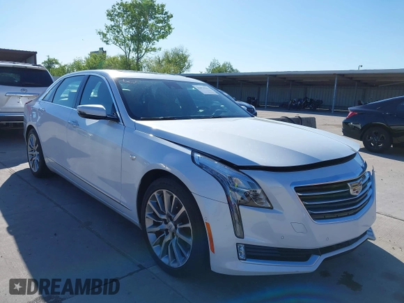 2018 Cadillac CT6 Luxury AWD z VIN 1G6KD5RS9JU151575, wystawiony jako IAAI lot #42078361 z przebiegiem 28 187 mil mil oraz . Historia ofert i sprzedaży dostępna na DreamBid. Obrazek 1.