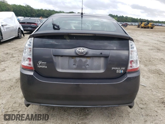 2008 Toyota Prius z VIN JTDKB20U383359984, wystawiony jako Copart lot #57209665 z przebiegiem 247 761 mil mil oraz Szkoda całkowita • Salvage title. Historia ofert i sprzedaży dostępna na DreamBid. Obrazek 6.
