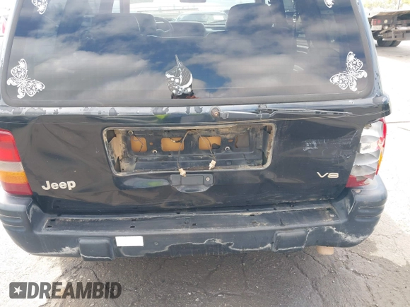 1996 Jeep Grand Cherokee Limited z VIN 1J4GZ78Y3TC191000, wystawiony jako IAAI lot #42259621 z przebiegiem 212 690 mil mil oraz . Historia ofert i sprzedaży dostępna na DreamBid. Obrazek 6.