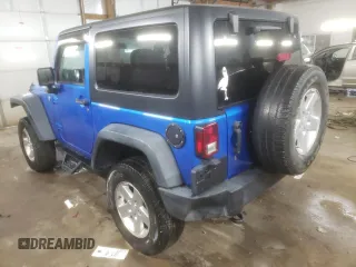 2015 Jeep Wrangler Willys Wheeler with VIN 1C4AJWAG2FL568130, listed as a Copart auction lot 80682914 with 111,686 mi miles and Salvage title. Bid and sale history available at DreamBid. Image 2.