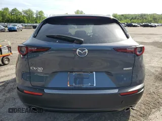 2024 Mazda CX-30 S Carbon Edition with VIN 3MVDMBCM0RM641898, listed as a Copart auction lot 57712225 with 9,185 mi miles and Salvage title. Bid and sale history available at DreamBid. Image 6.
