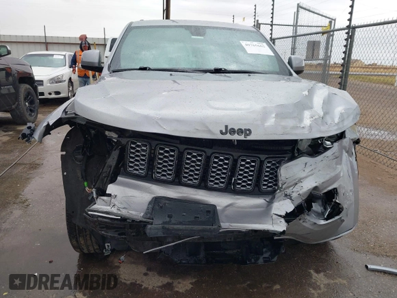 2020 Jeep Grand Cherokee Altitude with VIN 1C4RJEAG2LC392060, listed as a IAAI auction lot 40765662 with 30,505 mi miles and . Bid and sale history available at DreamBid. Image 6.