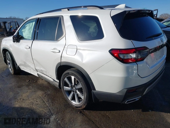 2024 Honda Pilot Touring with VIN 5FNYG2H7XRB016877, listed as a IAAI auction lot 41496013 with 18,213 mi miles and . Bid and sale history available at DreamBid. Image 3.