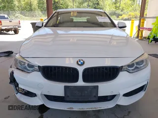 2015 BMW 4 Series 428i xDrive z VIN WBA4A7C55FD413965, wystawiony jako IAAI lot #42368615 z przebiegiem 108 308 mil mil oraz . Historia ofert i sprzedaży dostępna na DreamBid. Obrazek 12.