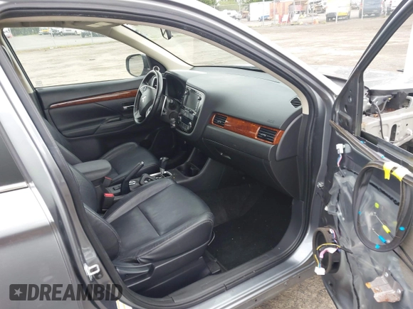 2014 Mitsubishi Outlander GT with VIN JA4JZ4AX9EZ017406, listed as a IAAI auction lot 42291696 with 107,680 mi miles and . Bid and sale history available at DreamBid. Image 5.