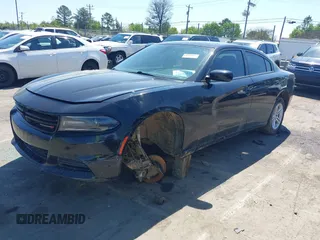 2019 Dodge Charger SXT with VIN 2C3CDXBG5KH713354, listed as a IAAI auction lot 41880772 with 133,408 mi miles. Bid and sale history available at carsss.com. Image 2.