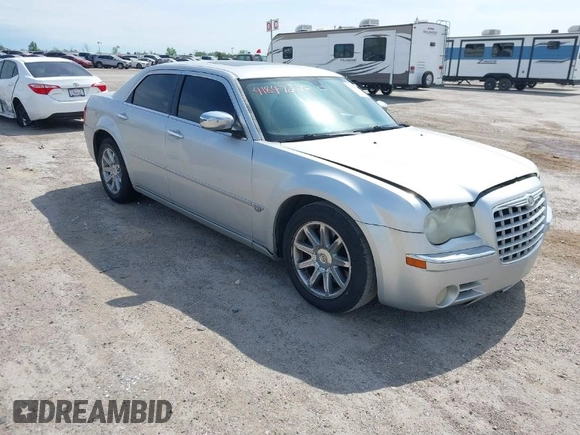 2005 Chrysler 300 with VIN 2C3JA63H05H693522, listed as a IAAI auction lot 41847279 with 162,037 mi miles. Bid and sale history available at carsss.com. Image 1.