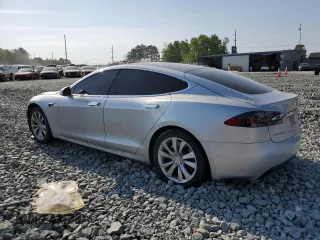 2017 Tesla Model S 60 with VIN 5YJSA1E15HF203248, listed as a Copart auction lot 54923855 with 84,214 mi miles and Salvage title. Bid and sale history available at DreamBid. Image 2.