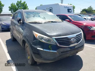 2013 Kia Sportage LX z VIN KNDPB3A2XD7411283, wystawiony jako IAAI lot #42560895 z przebiegiem 93 162 mil mil oraz . Historia ofert i sprzedaży dostępna na DreamBid. Obrazek 1.
