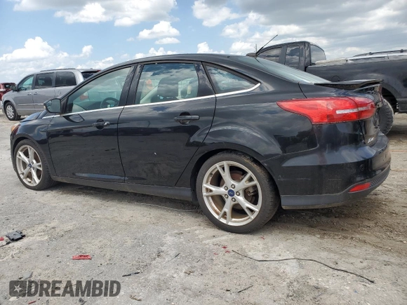 2015 Ford Focus Titanium with VIN 1FADP3J28FL362590, listed as a Copart auction lot 59759495 with 58,644 mi miles and Clean title. Bid and sale history available at DreamBid. Image 2.