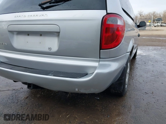 2004 Dodge Caravan SE with VIN 1D4GP24R14B562923, listed as a IAAI auction lot 41157893 with 169,040 mi miles. Bid and sale history available at carsss.com. Image 18.