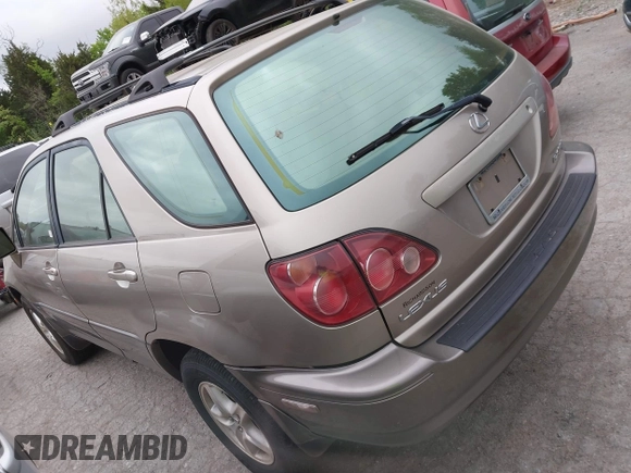 2000 Lexus RX 300 with VIN JT6HF10U5Y0134886, listed as a IAAI auction lot 42068102 with 156,237 mi miles. Bid and sale history available at carsss.com. Image 3.
