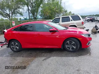 2020 Honda Civic LX z VIN 2HGFC2F65LH503209, wystawiony jako IAAI lot #42179492 z przebiegiem 50 747 mil mil oraz . Historia ofert i sprzedaży dostępna na DreamBid. Obrazek 14.
