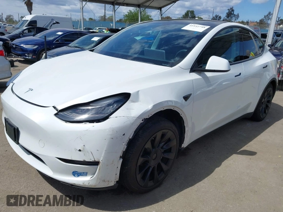 2020 Tesla Model Y Long Range with VIN 5YJYGDEE2LF058515, listed as a IAAI auction lot 41932748 with 62,885 mi miles and . Bid and sale history available at DreamBid. Image 23.