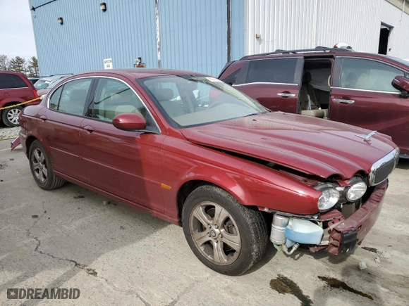 2002 Jaguar X-Type with VIN SAJEA51C32WC44965, listed as a Copart auction lot 45779295 with 48,225 mi miles and Salvage Title. Bid and sale history available at carsss.com. Image 4.