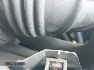 2005 Ford Econoline Cargo with VIN 1FTNS24W45HA25714, listed as a IAAI auction lot 42434486 with 298,437 mi miles and . Bid and sale history available at DreamBid. Image 12.