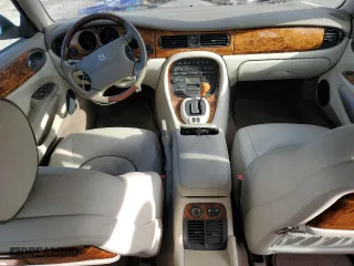 1999 Jaguar XJ with VIN SAJKX6040XC857312, listed as a Copart auction lot 84918704 with 75,425 mi miles and Clean Title. Bid and sale history available at carsss.com. Image 8.