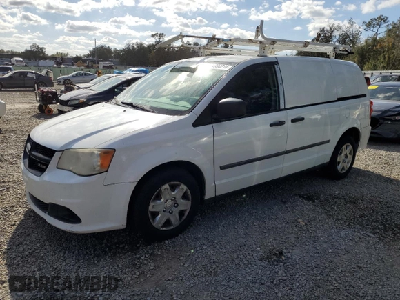 2013 Ram Cargo Van Tradesman with VIN 2C4JRGAGXDR812805, listed as a Copart auction lot 84934214 with 184,209 mi miles and Salvage Title. Bid and sale history available at carsss.com. Image 1.