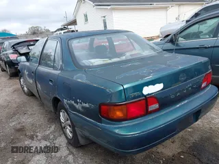 1996 Toyota Camry DX with VIN JT2BG12K1T0344507, listed as a IAAI auction lot 41832481 with 176,216 mi miles. Bid and sale history available at carsss.com. Image 3.