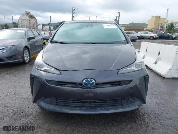 2019 Toyota Prius L Eco with VIN JTDKARFU3K3099256, listed as a IAAI auction lot 41813619 with 169,900 mi miles. Bid and sale history available at carsss.com. Image 6.