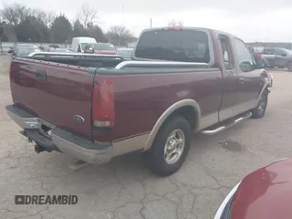 1998 Ford F-150 XL with VIN 1FTRX17L9WKA93669, listed as a IAAI auction lot 41531304 with 174,614 mi miles and . Bid and sale history available at DreamBid. Image 4.
