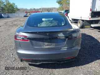2021 Tesla Model S Long Range with VIN 5YJSA1E52MF428370, listed as a IAAI auction lot 41809773 with 34,372 mi miles and . Bid and sale history available at DreamBid. Image 16.