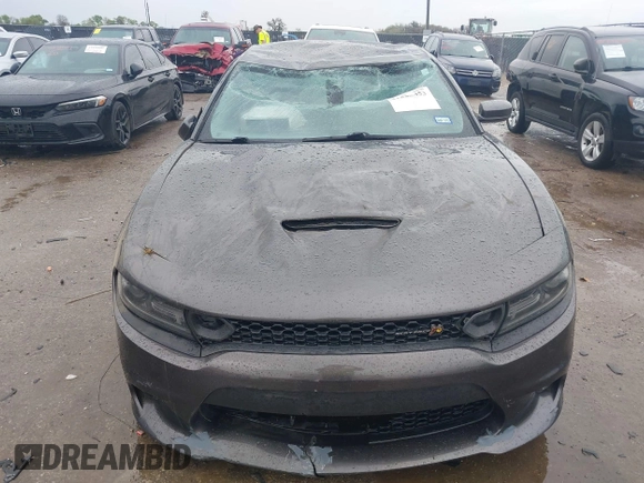 2020 Dodge Charger Scat Pack z VIN 2C3CDXGJXLH107344, wystawiony jako IAAI lot #41888453 z przebiegiem Nie podano mil oraz . Historia ofert i sprzedaży dostępna na DreamBid. Obrazek 13.