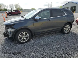2019 Chevrolet Equinox Premier z VIN 2GNAXNEV5K6302984, wystawiony jako Copart lot #56033935 z przebiegiem 59 554 mil mil oraz Szkoda całkowita • Salvage title. Historia ofert i sprzedaży dostępna na DreamBid. Obrazek 1.