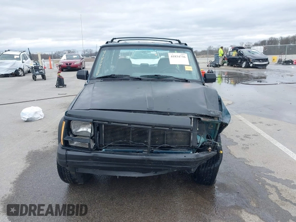1996 Jeep Cherokee Sport with VIN 1J4FJ68S5TL235507, listed as a IAAI auction lot 41834736 with 174,634 mi miles. Bid and sale history available at carsss.com. Image 12.