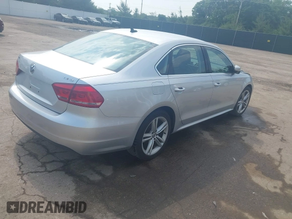 2014 Volkswagen Passat SE with VIN 1VWBT7A37EC039074, listed as a IAAI auction lot 42439583 with 109,654 mi miles and . Bid and sale history available at DreamBid. Image 4.