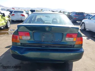 1998 Honda Civic EX with VIN 1HGEJ8240WL013387, listed as a IAAI auction lot 41302427 with 255,039 mi miles. Bid and sale history available at carsss.com. Image 6.