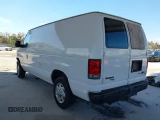 2014 Ford Econoline Cargo Commercial with VIN 1FTNE1EW1EDA66485, listed as a IAAI auction lot 41654271 with 304,974 mi miles and . Bid and sale history available at DreamBid. Image 3.