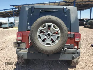 2010 Jeep Wrangler Rubicon with VIN 1J4BA6D14AL167077, listed as a Copart auction lot 54233795 with 148,638 mi miles and Salvage title. Bid and sale history available at DreamBid. Image 6.