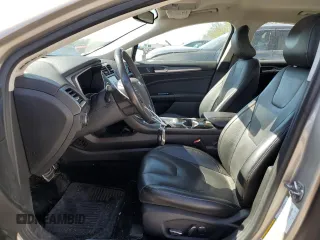 2016 Ford Fusion Titanium Hybrid with VIN 3FA6P0RU0GR153294, listed as a Copart auction lot 52723515 with 117,570 mi miles and Salvage title. Bid and sale history available at DreamBid. Image 7.