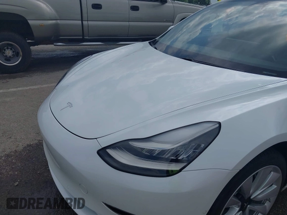 2020 Tesla Model 3 Standard Range Plus z VIN 5YJ3E1EA9LF598682, wystawiony jako IAAI lot #42247434 z przebiegiem 28 835 mil mil oraz . Historia ofert i sprzedaży dostępna na DreamBid. Obrazek 6.