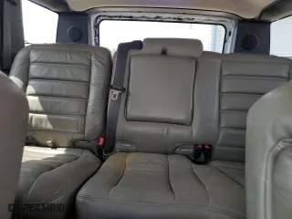 2005 Hummer H2 SUV with VIN 5GRGN23U15H130452, listed as a Copart auction lot 68099154 with 151,369 mi miles and Salvage Title. Bid and sale history available at carsss.com. Image 10.