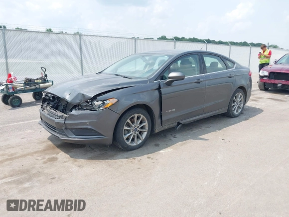 2017 Ford Fusion Hybrid SE with VIN 3FA6P0LUXHR279771, listed as a IAAI auction lot 42417831 with 189,493 mi miles and . Bid and sale history available at DreamBid. Image 20.