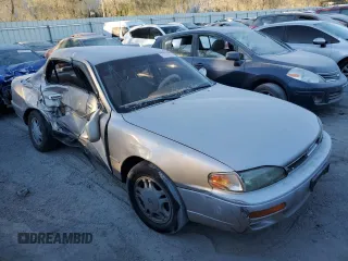 1995 Toyota Camry LE with VIN 4T1GK12E5SU76389, listed as a Copart auction lot 83120474 with 245,875 mi miles and Non Repairable. Bid and sale history available at carsss.com. Image 4.
