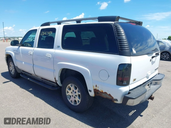 2003 Chevrolet Suburban LT z VIN 3GNFK16Z33G308805, wystawiony jako IAAI lot #42612393 z przebiegiem 205 213 mil mil oraz . Historia ofert i sprzedaży dostępna na DreamBid. Obrazek 3.