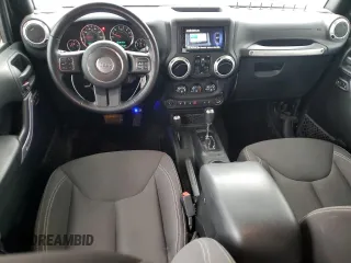 2017 Jeep Wrangler Unlimited Sahara with VIN 1C4BJWEGXHL594203, listed as a Copart auction lot 57359515 with 101,763 mi miles and Salvage title. Bid and sale history available at DreamBid. Image 8.