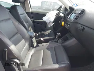2012 Volkswagen Tiguan SE with VIN WVGAV7AX6CW521960, listed as a IAAI auction lot 42249355 with 118,496 mi miles and . Bid and sale history available at DreamBid. Image 5.
