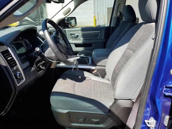 2018 Ram 1500 SLT with VIN 1C6RR7GG7JS247280, listed as a Copart auction lot 56321714 with 92,296 mi miles and Salvage title. Bid and sale history available at DreamBid. Image 7.