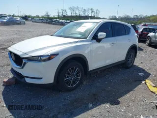 2021 Mazda CX-5 Touring z VIN JM3KFBCM2M1395663, wystawiony jako IAAI lot #41948073 z przebiegiem 47 029 mil mil oraz . Historia ofert i sprzedaży dostępna na DreamBid. Obrazek 18.